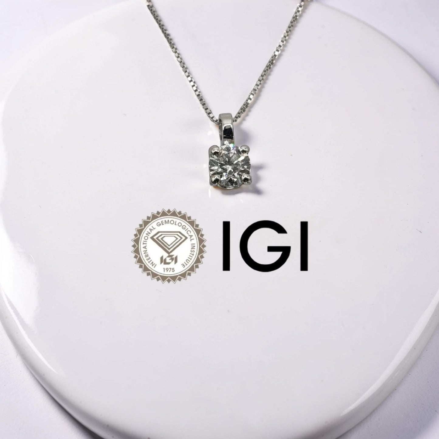 punto luce oro bianco 18kt con diamante naturale 0,40 ct colore d purezza vs1 certificato igi