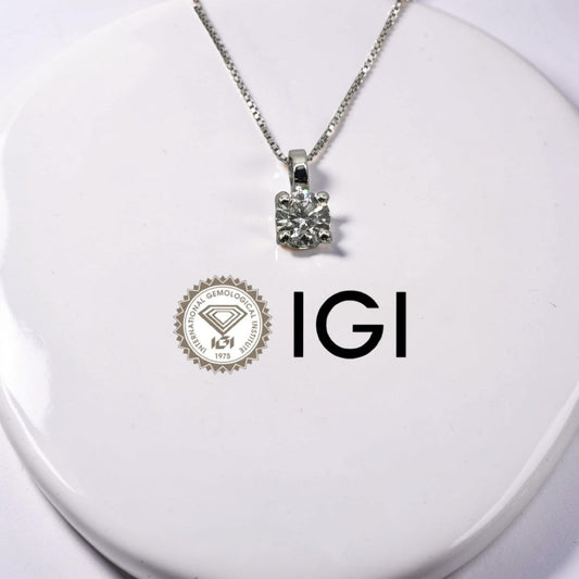 Punto luce oro bianco 18kt con diamante naturale 0,40 ct colore D purezza VS1 certificato IGI