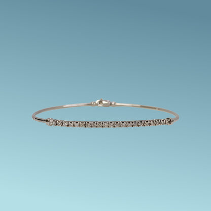 Bracciale semirigido in oro bianco 18kt di Meteore Gioielli con la parte centrale formata da una montatura tennis con diamanti naturali di 0.26 ct.